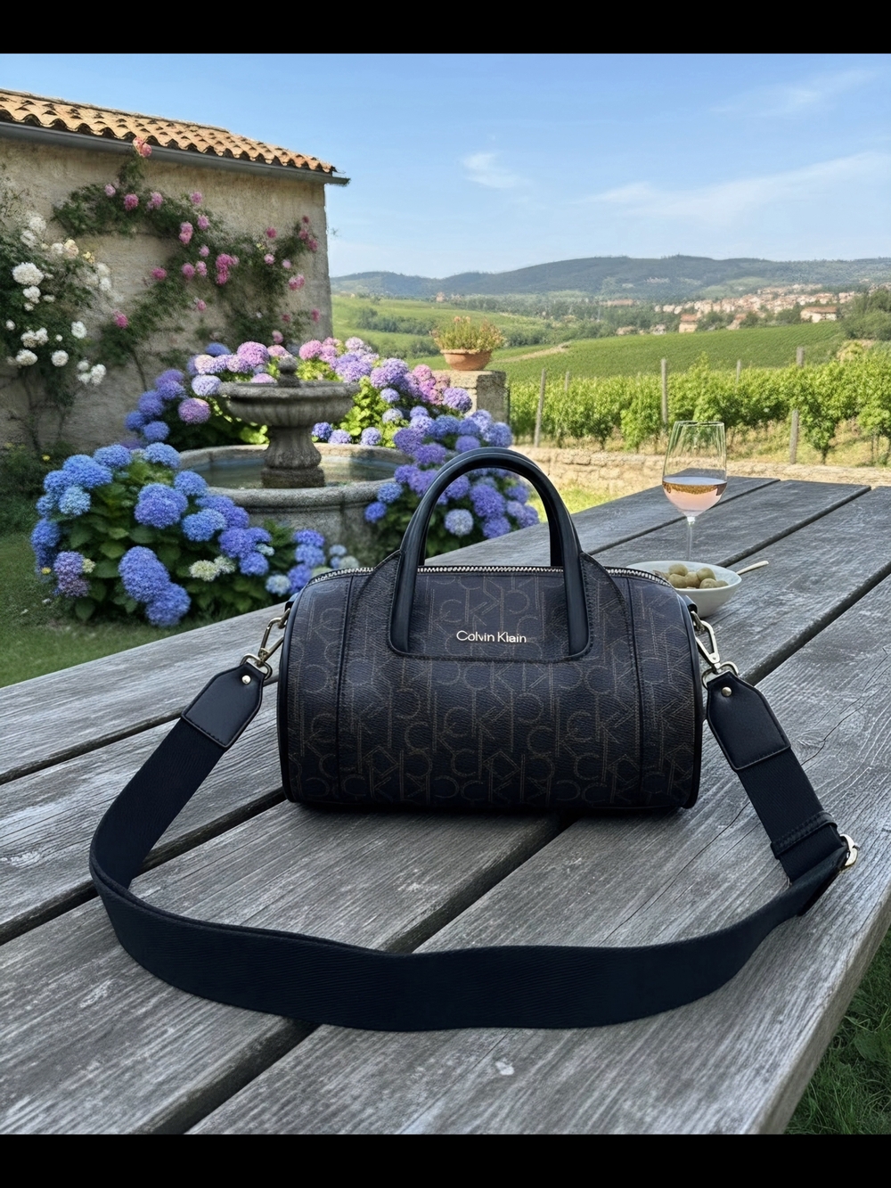 Calvin Klein Dark Brown Monogram Mini Barrel Bag with Navy Strap